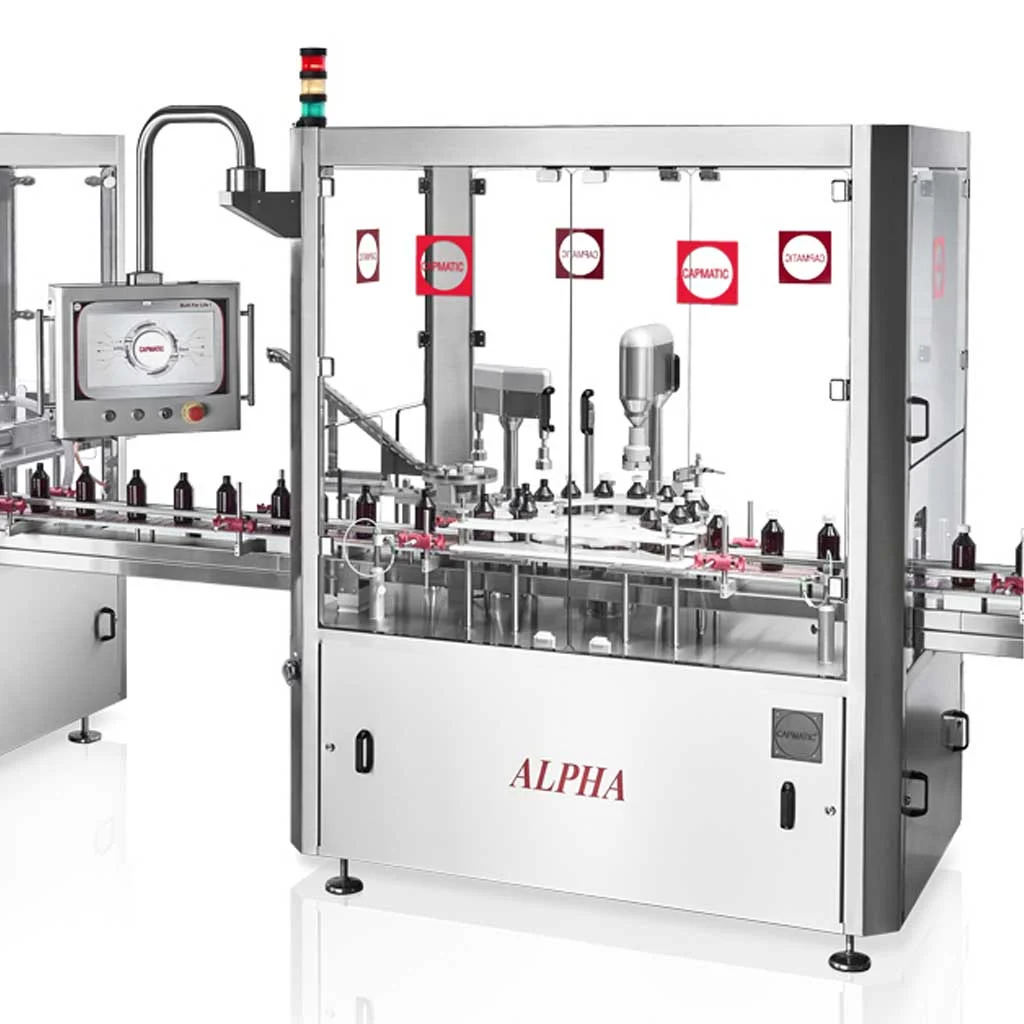 Alpha rotary chuck capper