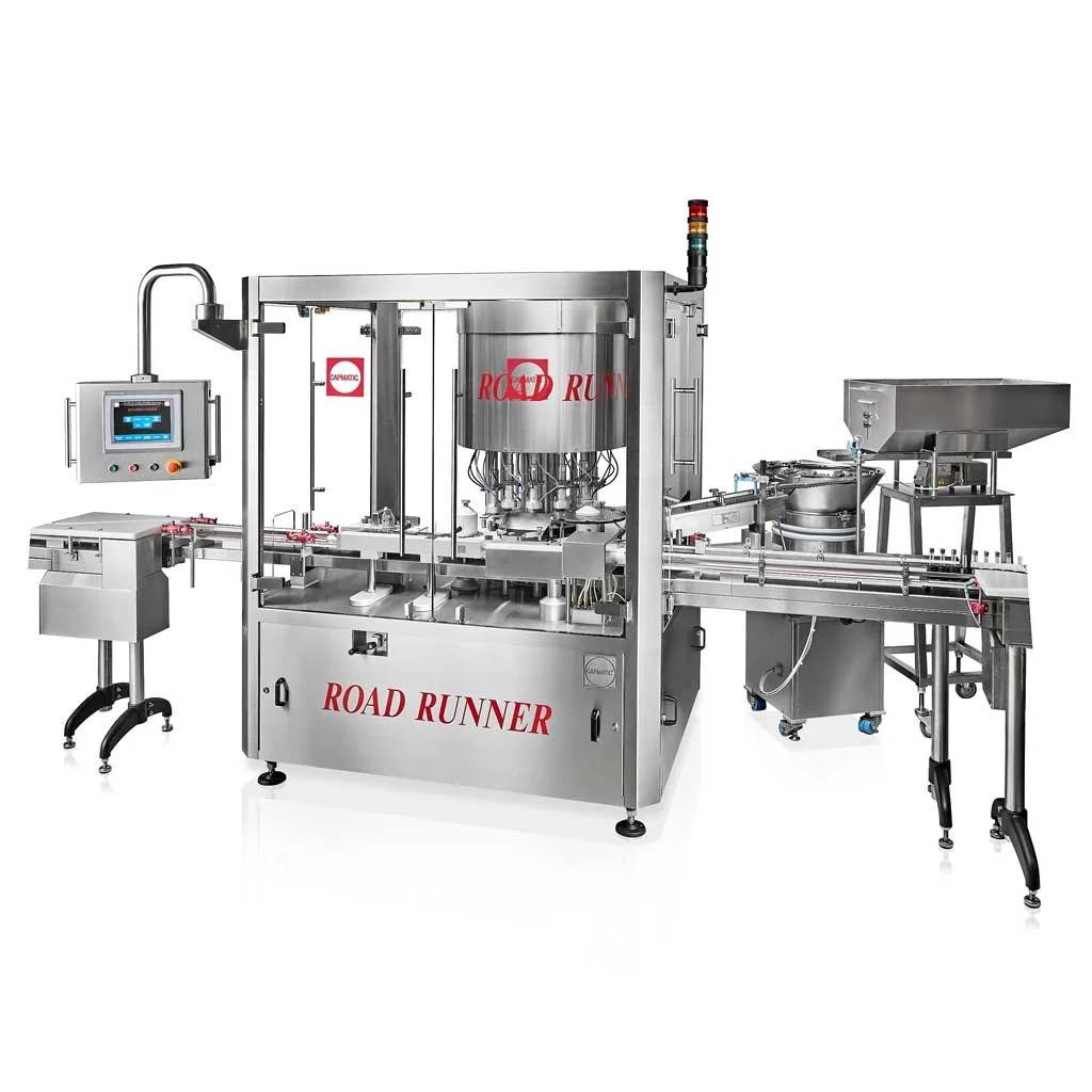 Road runner continuous motion rotary capper